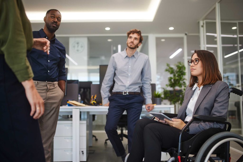 group of young business people conversing